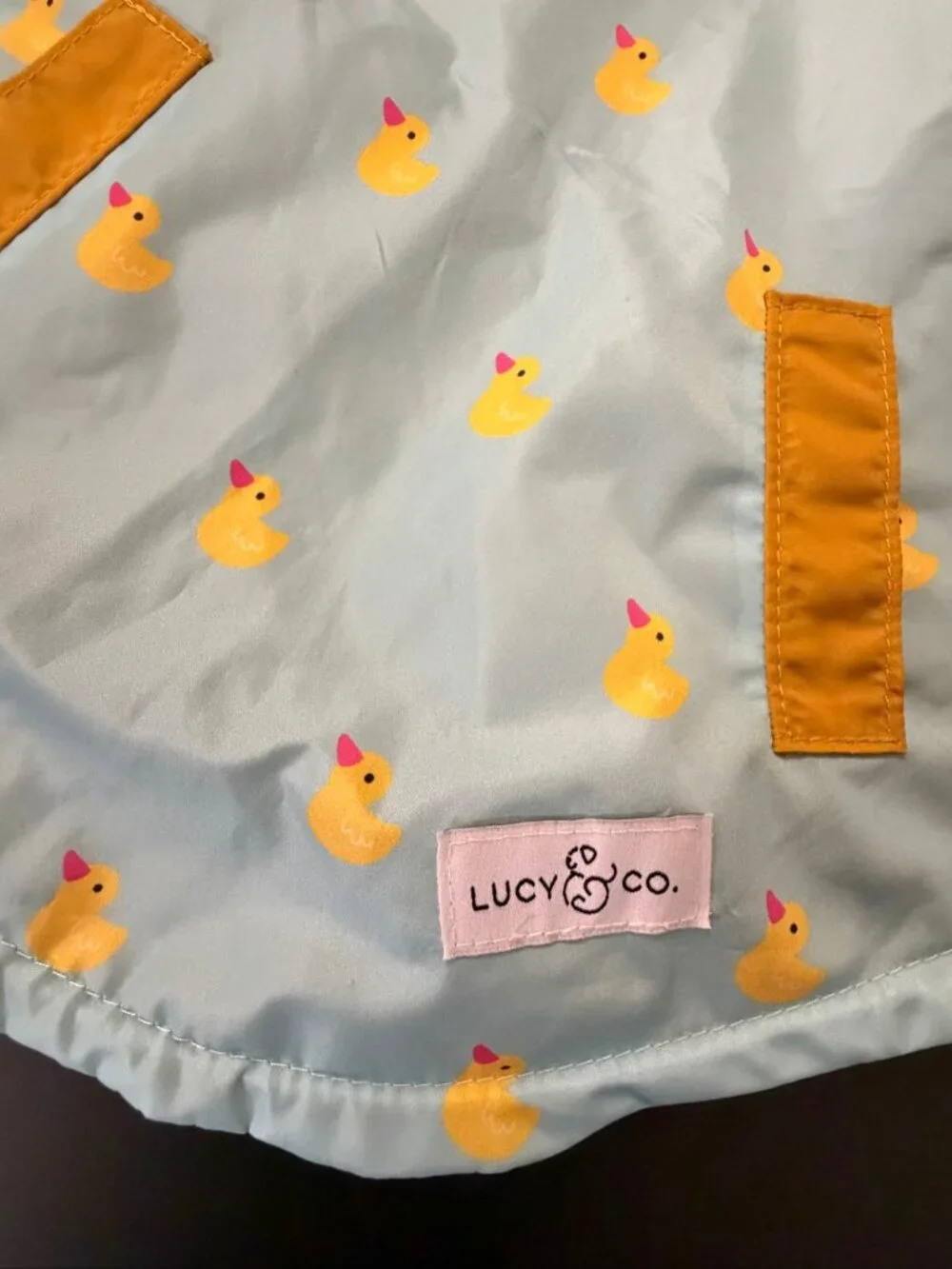 Lucy & Co. Lucky Ducky Reversible Dog Raincoat Size L Aqua Duck Print
